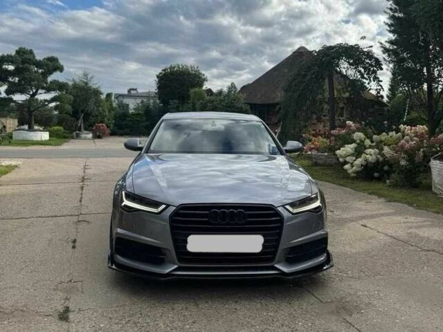 Серый Ауди А6, объемом двигателя 2 л и пробегом 140 тыс. км за 13300 $, фото 1 на Automoto.ua