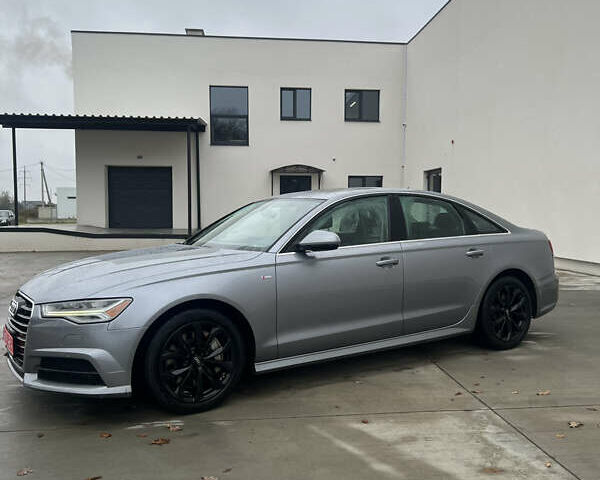 Сірий Ауді А6, об'ємом двигуна 1.98 л та пробігом 209 тис. км за 17999 $, фото 1 на Automoto.ua