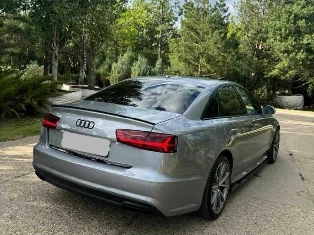 Серый Ауди А6, объемом двигателя 2 л и пробегом 140 тыс. км за 13300 $, фото 4 на Automoto.ua