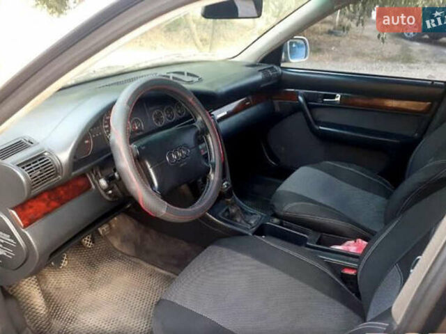 Серый Ауди А6, объемом двигателя 2.6 л и пробегом 670 тыс. км за 3800 $, фото 4 на Automoto.ua