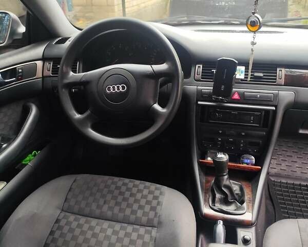 Серый Ауди А6, объемом двигателя 1.78 л и пробегом 337 тыс. км за 4500 $, фото 12 на Automoto.ua