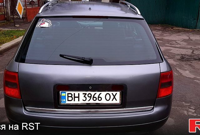 Серый Ауди А6, объемом двигателя 2.5 л и пробегом 312 тыс. км за 4000 $, фото 1 на Automoto.ua