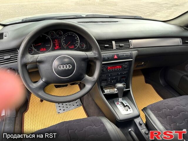 Серый Ауди А6, объемом двигателя 2.5 л и пробегом 350 тыс. км за 4750 $, фото 7 на Automoto.ua