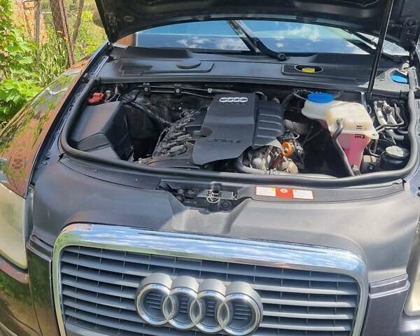 Серый Ауди А6, объемом двигателя 2 л и пробегом 312 тыс. км за 9000 $, фото 1 на Automoto.ua