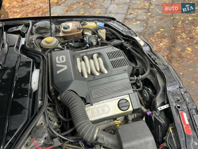 Синий Ауди А6, объемом двигателя 2.6 л и пробегом 286 тыс. км за 4200 $, фото 13 на Automoto.ua
