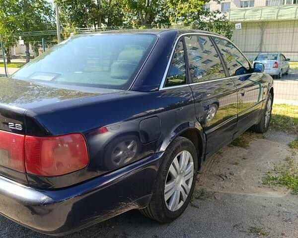 Синий Ауди А6, объемом двигателя 2.6 л и пробегом 314 тыс. км за 3750 $, фото 2 на Automoto.ua