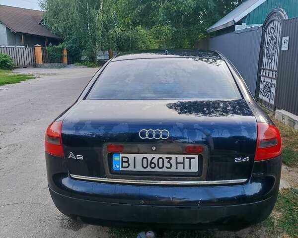 Синий Ауди А6, объемом двигателя 2.4 л и пробегом 370 тыс. км за 3800 $, фото 3 на Automoto.ua