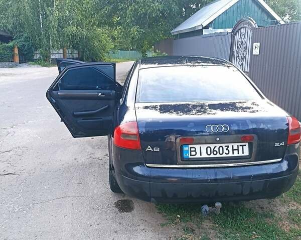 Синий Ауди А6, объемом двигателя 2.4 л и пробегом 370 тыс. км за 3800 $, фото 4 на Automoto.ua