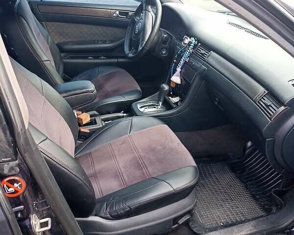 Синий Ауди А6, объемом двигателя 2.4 л и пробегом 370 тыс. км за 3800 $, фото 6 на Automoto.ua