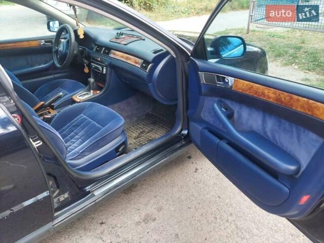 Синій Ауді А6, об'ємом двигуна 2.39 л та пробігом 291 тис. км за 3500 $, фото 6 на Automoto.ua