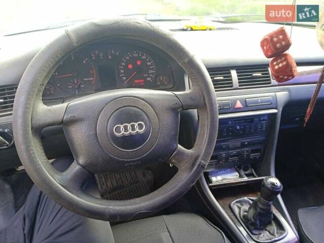 Синий Ауди А6, объемом двигателя 2.5 л и пробегом 330 тыс. км за 4650 $, фото 4 на Automoto.ua