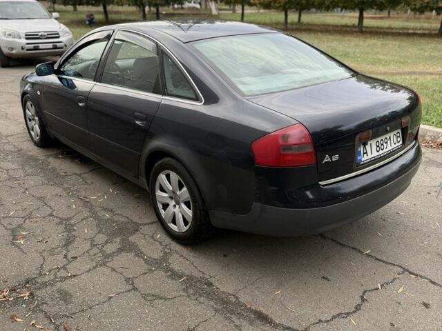 Синий Ауди А6, объемом двигателя 1.8 л и пробегом 310 тыс. км за 2602 $, фото 2 на Automoto.ua