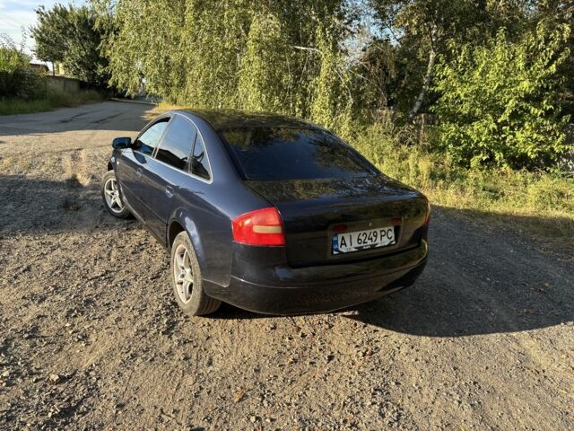 Синий Ауди А6, объемом двигателя 2.4 л и пробегом 230 тыс. км за 3700 $, фото 4 на Automoto.ua