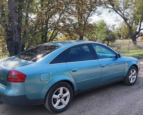 Синий Ауди А6, объемом двигателя 2.4 л и пробегом 450 тыс. км за 3850 $, фото 1 на Automoto.ua