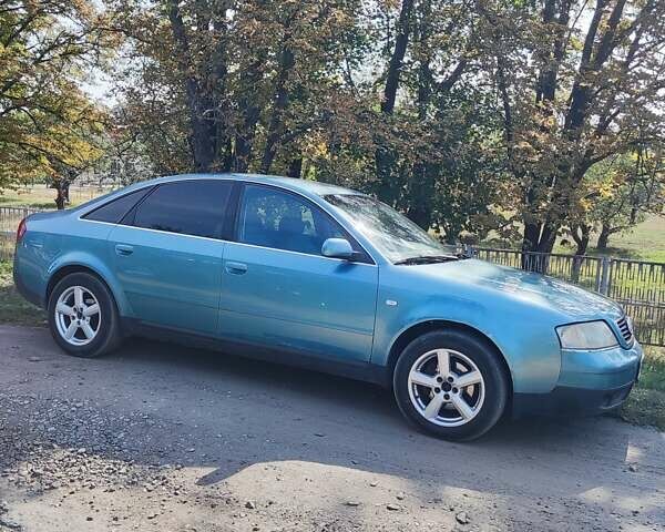 Синий Ауди А6, объемом двигателя 2.4 л и пробегом 450 тыс. км за 3850 $, фото 6 на Automoto.ua