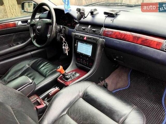 Синий Ауди А6, объемом двигателя 2.4 л и пробегом 382 тыс. км за 3900 $, фото 7 на Automoto.ua