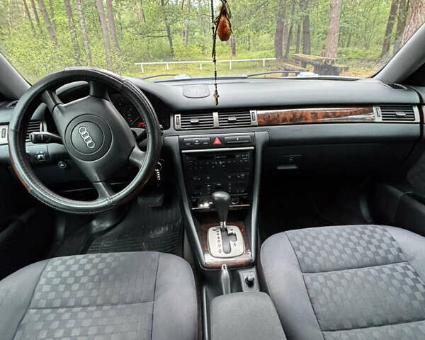 Синий Ауди А6, объемом двигателя 2.39 л и пробегом 289 тыс. км за 4100 $, фото 7 на Automoto.ua