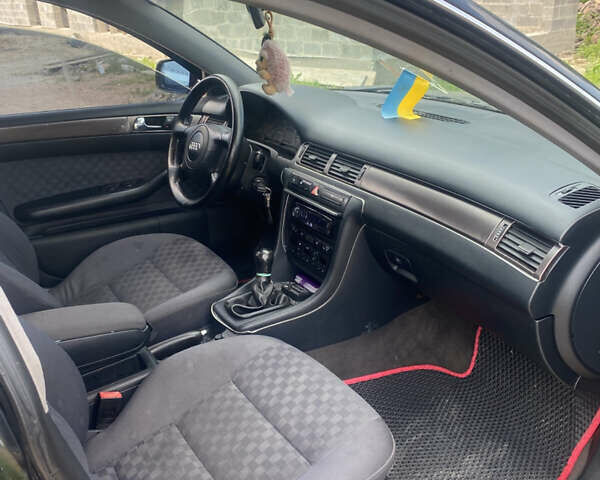Синий Ауди А6, объемом двигателя 2.4 л и пробегом 222 тыс. км за 3500 $, фото 6 на Automoto.ua