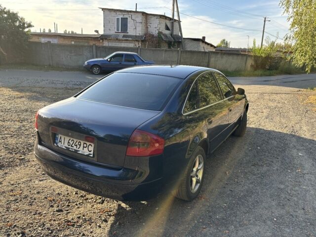 Синий Ауди А6, объемом двигателя 2.4 л и пробегом 230 тыс. км за 3700 $, фото 1 на Automoto.ua