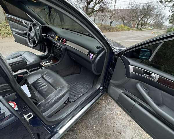 Синий Ауди А6, объемом двигателя 1.78 л и пробегом 370 тыс. км за 4800 $, фото 7 на Automoto.ua
