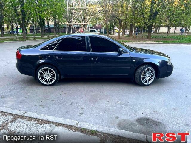 Синий Ауди А6, объемом двигателя 2.5 л и пробегом 320 тыс. км за 4500 $, фото 1 на Automoto.ua