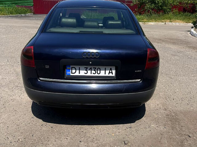 Синий Ауди А6, объемом двигателя 2.5 л и пробегом 400 тыс. км за 3900 $, фото 6 на Automoto.ua