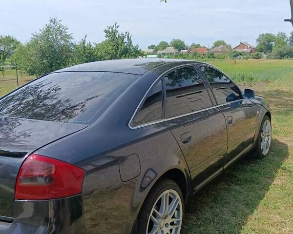Синий Ауди А6, объемом двигателя 2.5 л и пробегом 333 тыс. км за 4300 $, фото 8 на Automoto.ua