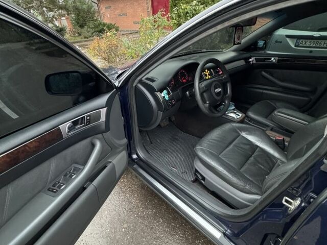 Синий Ауди А6, объемом двигателя 1.8 л и пробегом 370 тыс. км за 4800 $, фото 10 на Automoto.ua