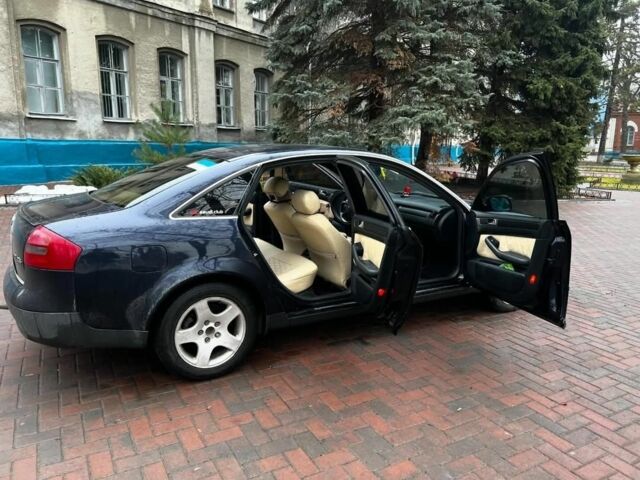 Синий Ауди А6, объемом двигателя 2.5 л и пробегом 400 тыс. км за 4500 $, фото 1 на Automoto.ua