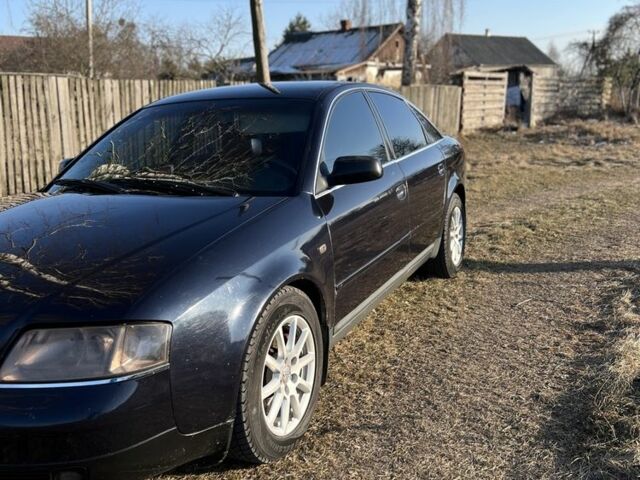 Синий Ауди А6, объемом двигателя 2.5 л и пробегом 299 тыс. км за 3800 $, фото 1 на Automoto.ua