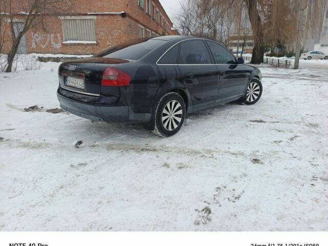 Синий Ауди А6, объемом двигателя 2.5 л и пробегом 300 тыс. км за 2900 $, фото 3 на Automoto.ua