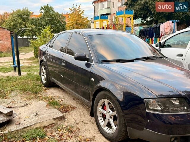 Синий Ауди А6, объемом двигателя 1.8 л и пробегом 300 тыс. км за 4400 $, фото 1 на Automoto.ua