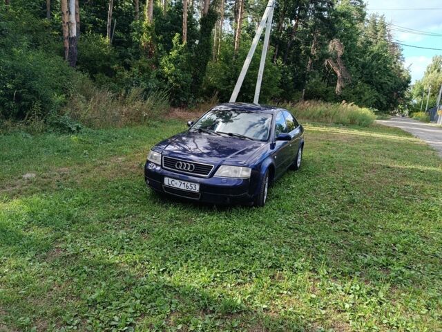 Синий Ауди А6, объемом двигателя 2.5 л и пробегом 400 тыс. км за 1600 $, фото 1 на Automoto.ua