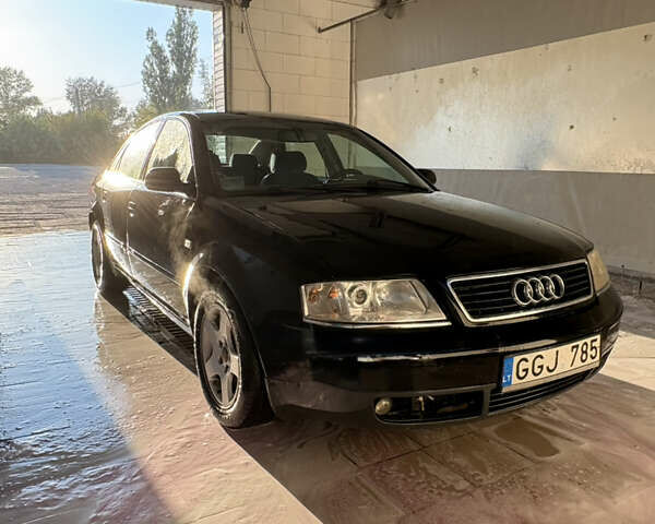 Синий Ауди А6, объемом двигателя 2.5 л и пробегом 281 тыс. км за 3079 $, фото 1 на Automoto.ua