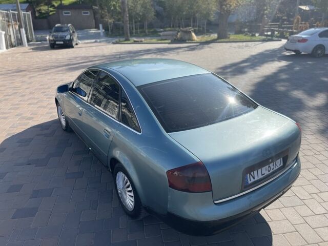 Синій Ауді А6, об'ємом двигуна 1.9 л та пробігом 250 тис. км за 1999 $, фото 4 на Automoto.ua