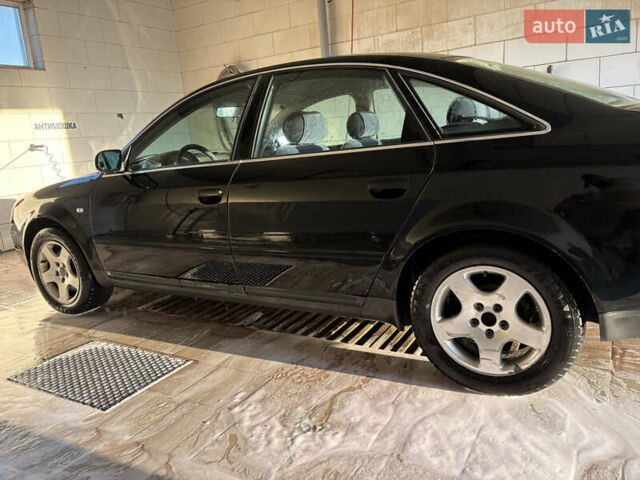 Синий Ауди А6, объемом двигателя 2.5 л и пробегом 281 тыс. км за 3079 $, фото 5 на Automoto.ua