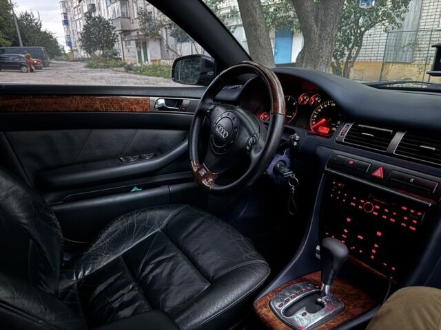 Синий Ауди А6, объемом двигателя 2.5 л и пробегом 458 тыс. км за 5500 $, фото 6 на Automoto.ua