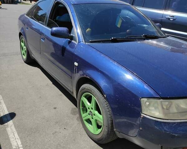 Синий Ауди А6, объемом двигателя 2.5 л и пробегом 300 тыс. км за 3598 $, фото 4 на Automoto.ua