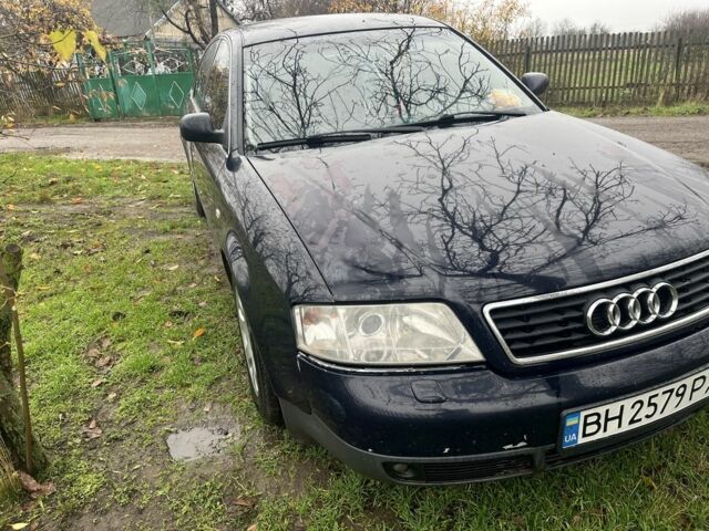 Синий Ауди А6, объемом двигателя 1.8 л и пробегом 345 тыс. км за 3000 $, фото 1 на Automoto.ua