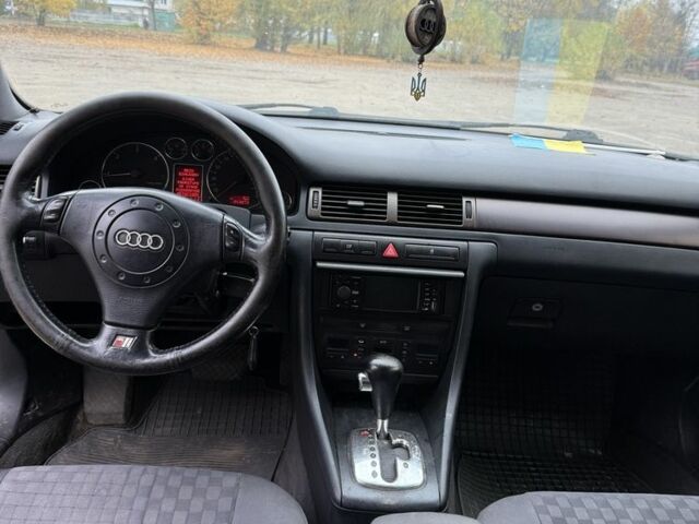 Синий Ауди А6, объемом двигателя 2.5 л и пробегом 250 тыс. км за 1751 $, фото 9 на Automoto.ua