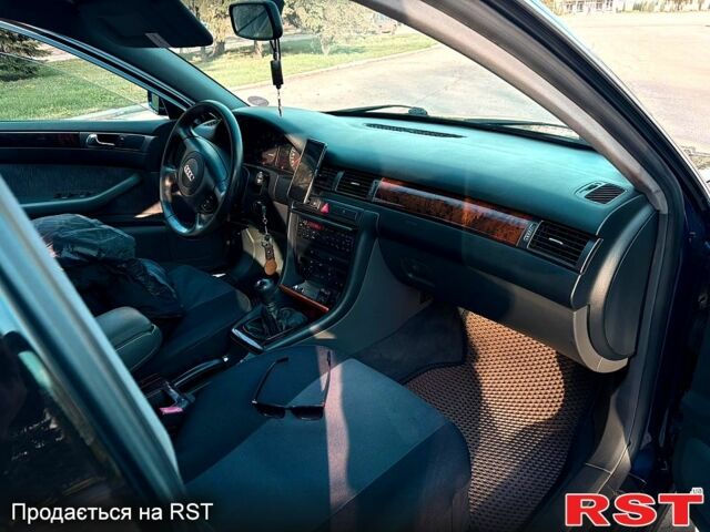 Синий Ауди А6, объемом двигателя 2.4 л и пробегом 285 тыс. км за 5500 $, фото 8 на Automoto.ua