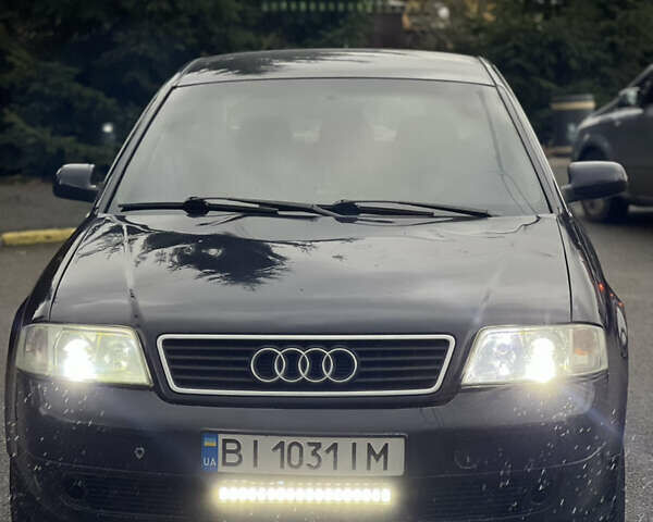 Синий Ауди А6, объемом двигателя 2.5 л и пробегом 328 тыс. км за 3300 $, фото 1 на Automoto.ua
