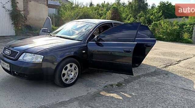 Синий Ауди А6, объемом двигателя 2.4 л и пробегом 317 тыс. км за 4500 $, фото 7 на Automoto.ua