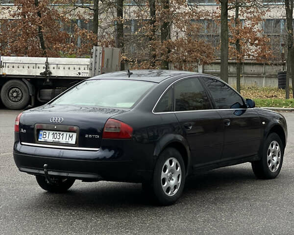 Синий Ауди А6, объемом двигателя 2.5 л и пробегом 328 тыс. км за 3300 $, фото 5 на Automoto.ua