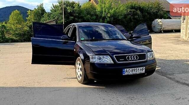 Синий Ауди А6, объемом двигателя 2.4 л и пробегом 317 тыс. км за 4500 $, фото 6 на Automoto.ua