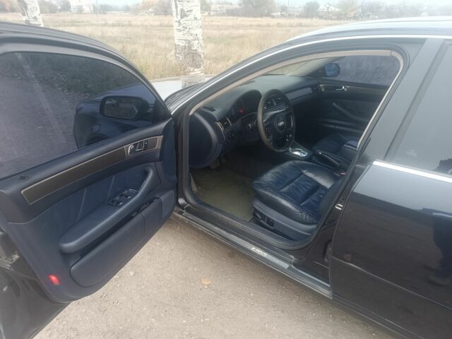 Синий Ауди А6, объемом двигателя 2 л и пробегом 310 тыс. км за 2300 $, фото 4 на Automoto.ua