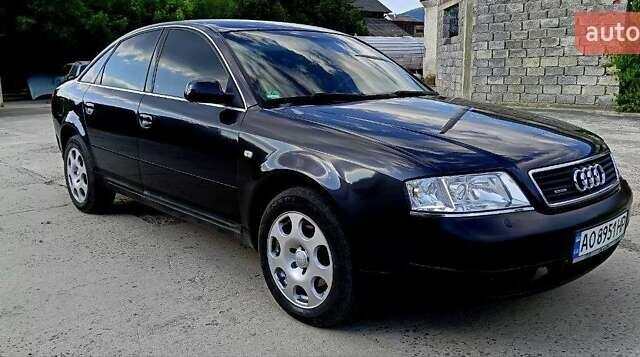 Синий Ауди А6, объемом двигателя 2.4 л и пробегом 317 тыс. км за 4500 $, фото 2 на Automoto.ua