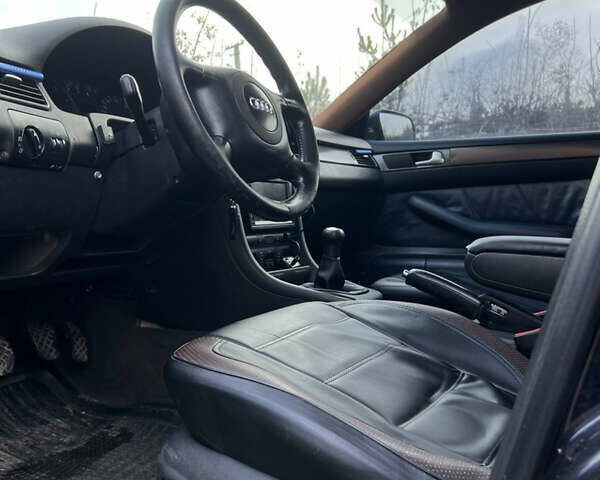 Синий Ауди А6, объемом двигателя 1.78 л и пробегом 310 тыс. км за 4500 $, фото 14 на Automoto.ua