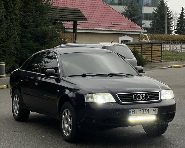 Синий Ауди А6, объемом двигателя 2.5 л и пробегом 328 тыс. км за 3300 $, фото 2 на Automoto.ua