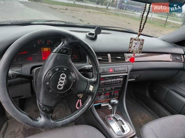 Синий Ауди А6, объемом двигателя 2.5 л и пробегом 277 тыс. км за 4000 $, фото 4 на Automoto.ua